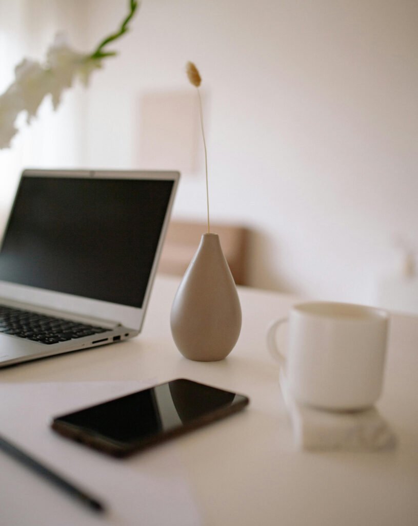 laptop-on-table-with-cup-of-coffee-and-mobile-phone